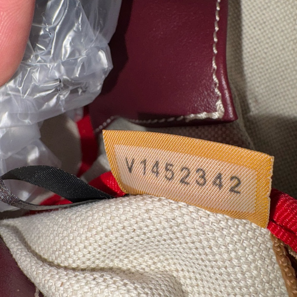 Dooney and Burke Drawstringng Backpack in color Grape. - Picture 6 of 12